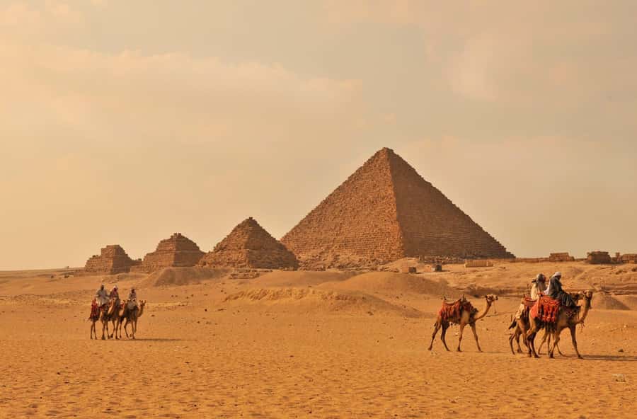 Cairo: Giza Pyramids Camel Ride and Egyptian Museum Tour - First stop: Giza pyramids, camel ride, and Sphinx photo time