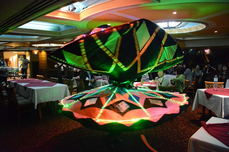 Cairo: Nile Sunset Dinner Cruise, Show & Optional Transfer - The show onboard: belly dancing, folklore, and live music
