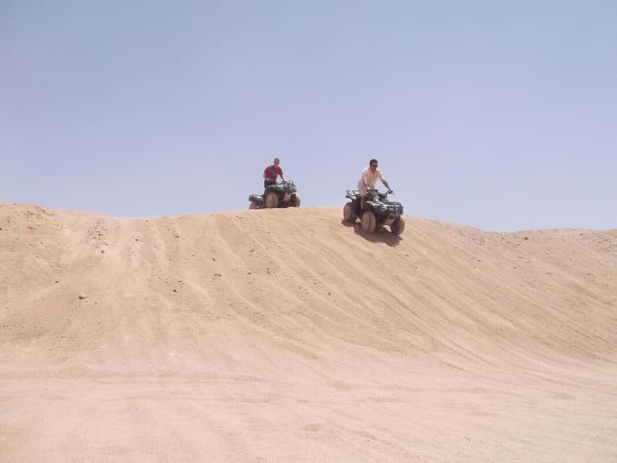 Desert Sunset Quad Bike ATV for 50Km, Oriental Show, Dinner, - Sunset View, Dinner Buffet, Belly Dancer, and Fire Show