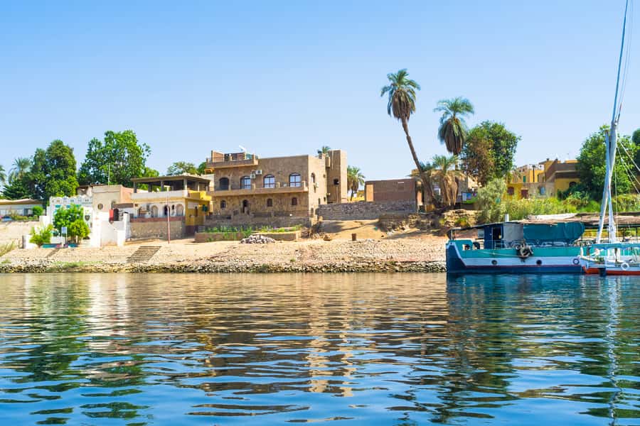 From Aswan: Philae Temple & Motorboat Tour to Nubian Village - Nubian Village Walk: Colorful Houses, Tea Moments, and Shopping Time