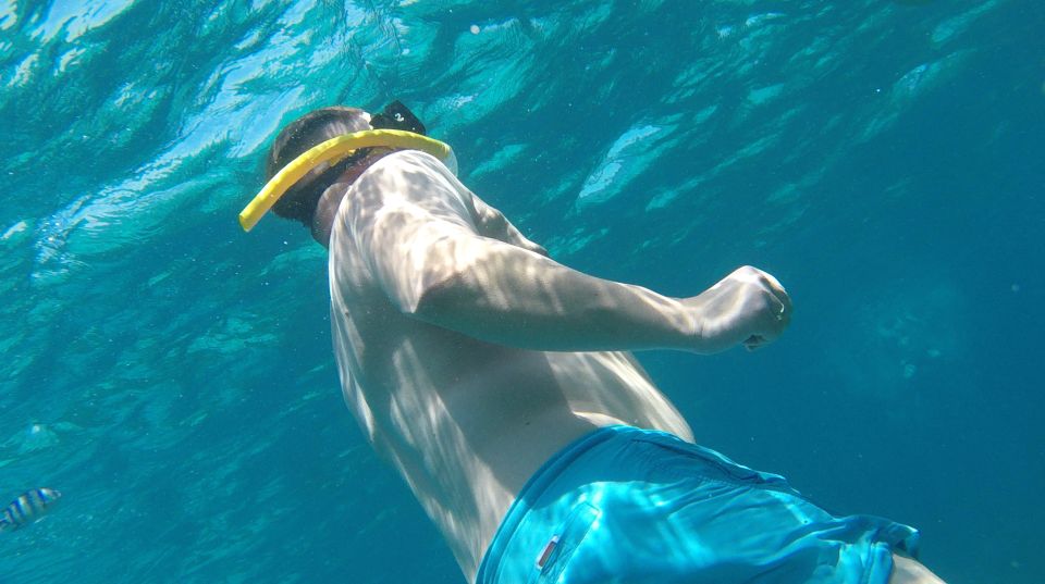 Hurghada: Orange Bay & Giftun Island, Snorkeling With Lunch - Lunch on Board: Buffet Style, Local Fruit, and What to Watch For