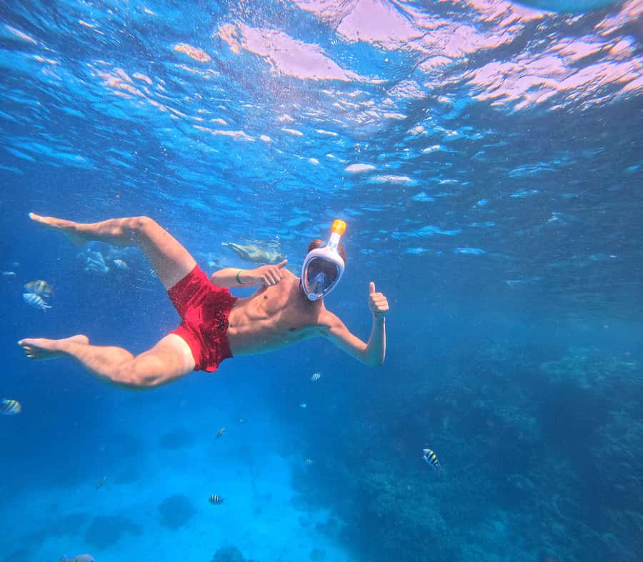 Hurghada: Orange Bay Island with breakfast, lunch & watersports - Banana boat or sofa ride: the fun break between reef and relaxation